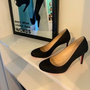 Authentic Black Nabuk Christian Louboutin Pumps.